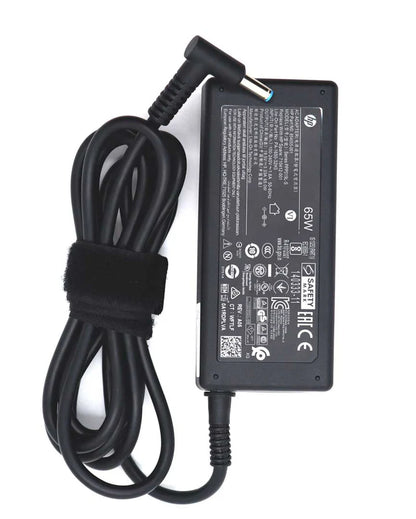 HP laptop adapter with power cord on a white background