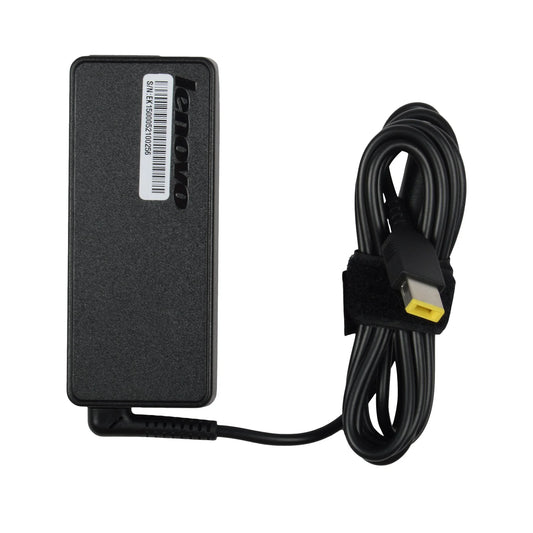 Black power adapter with USB cable on a white background